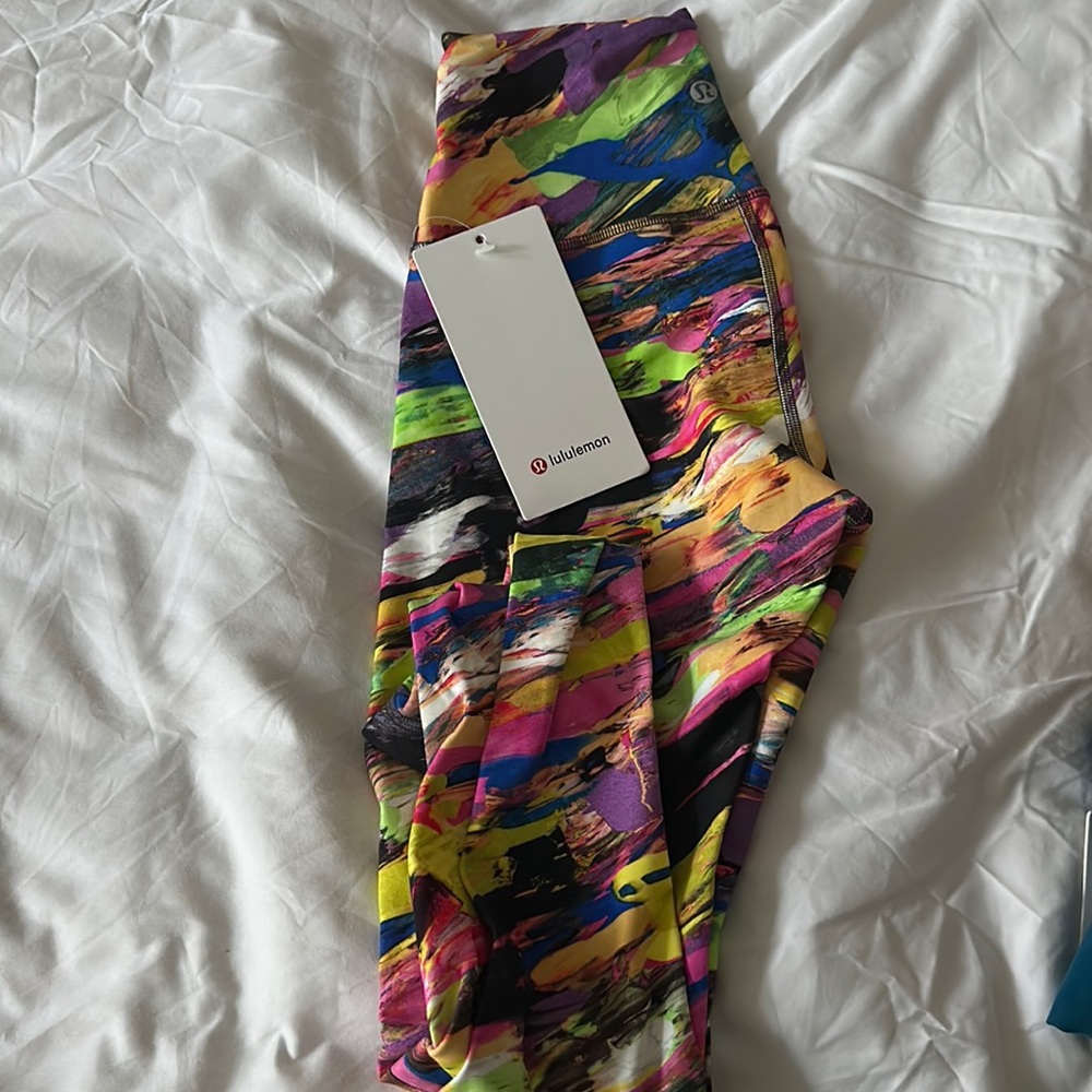 Lululemon women’s Wunder Train HR Tight 25”, size 4, color CYMT